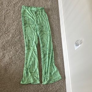green flared leggings